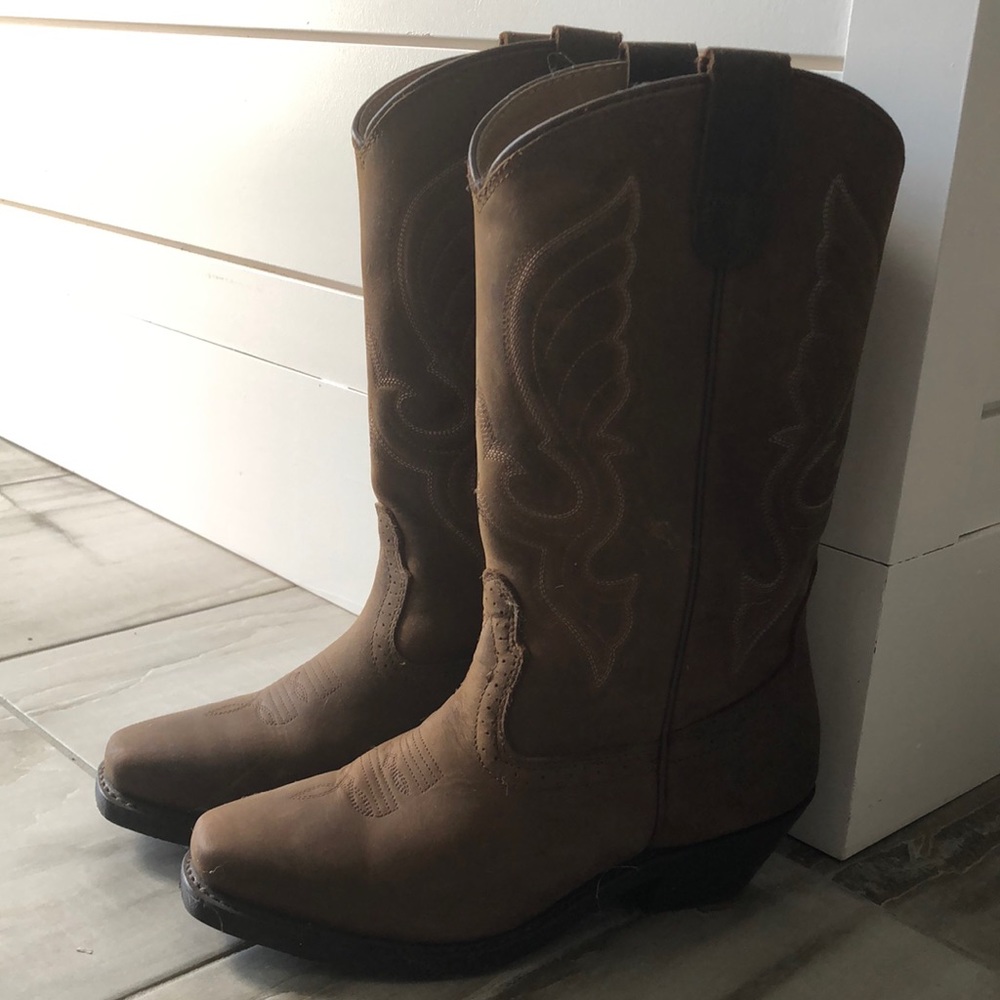 Cowgirl boots. Shyanne size 7. Bought at boot barn for $200. Worn twice.